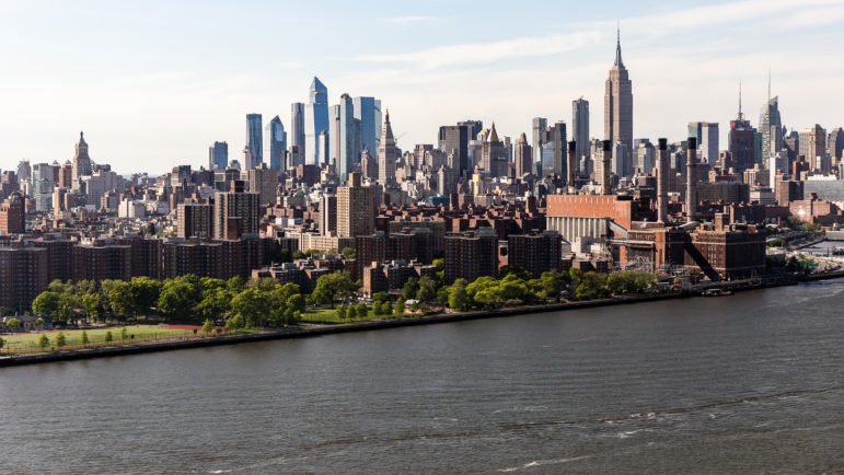 A view of the Manhattan skyline and the East River.